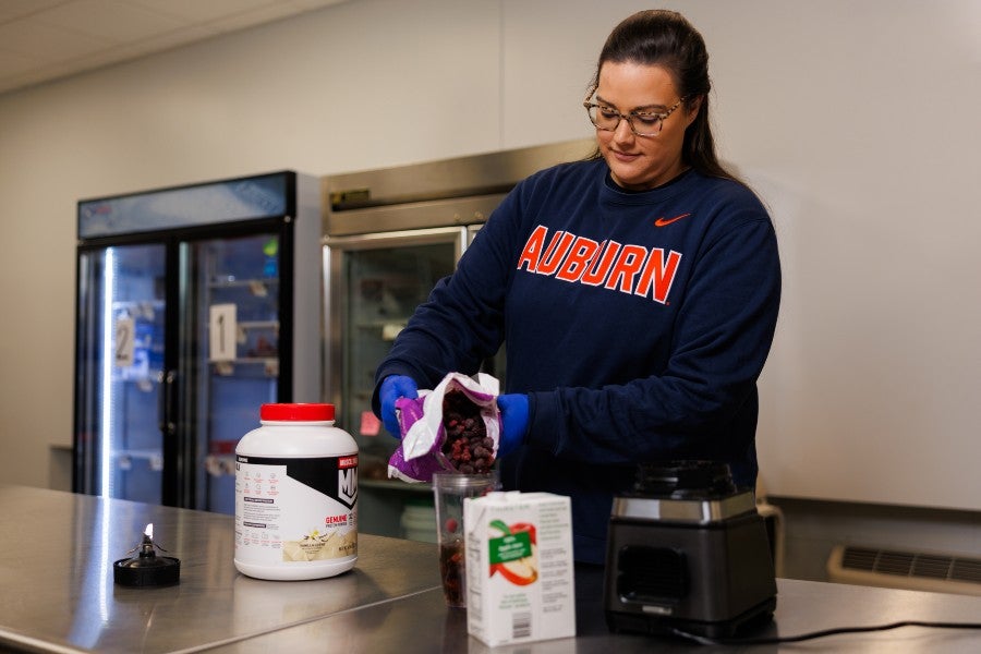 Lee Stowers preparing a protein snack for athletes