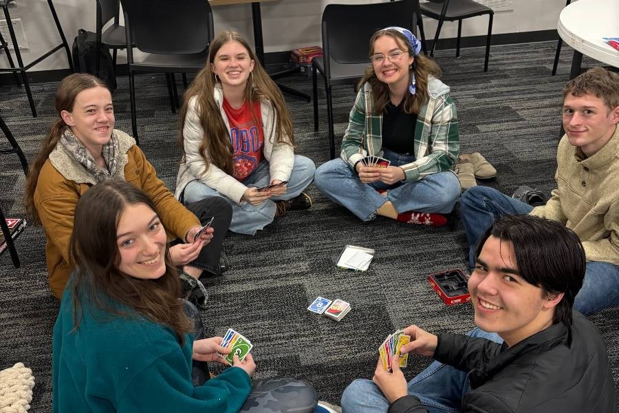 Students playing Uno during the winter storm. 