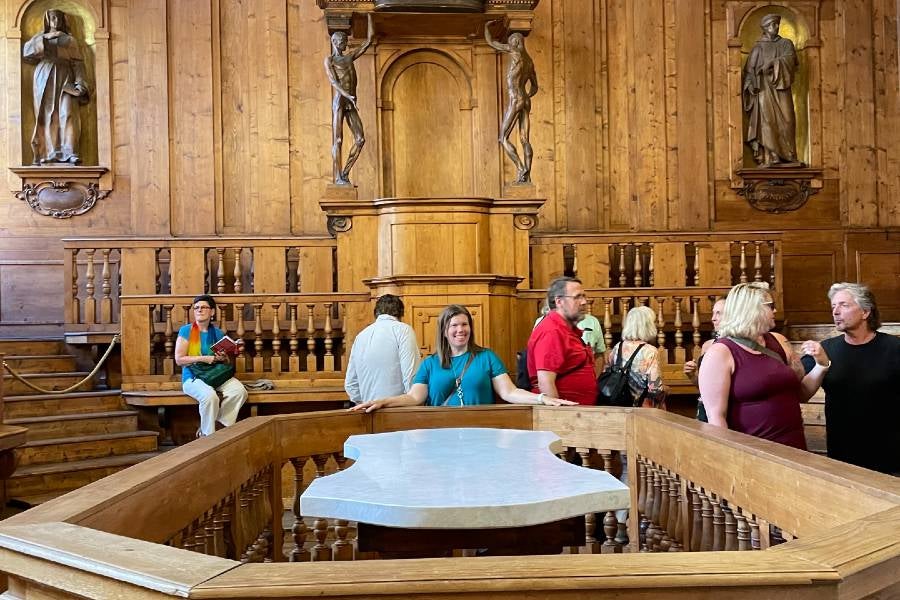 Faculty Jill Kirby posing in an Italian anatomical theater
