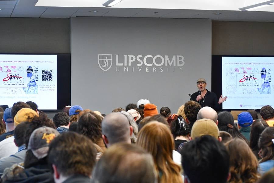An animation expert speaks to a packed Rogers Board Room. 