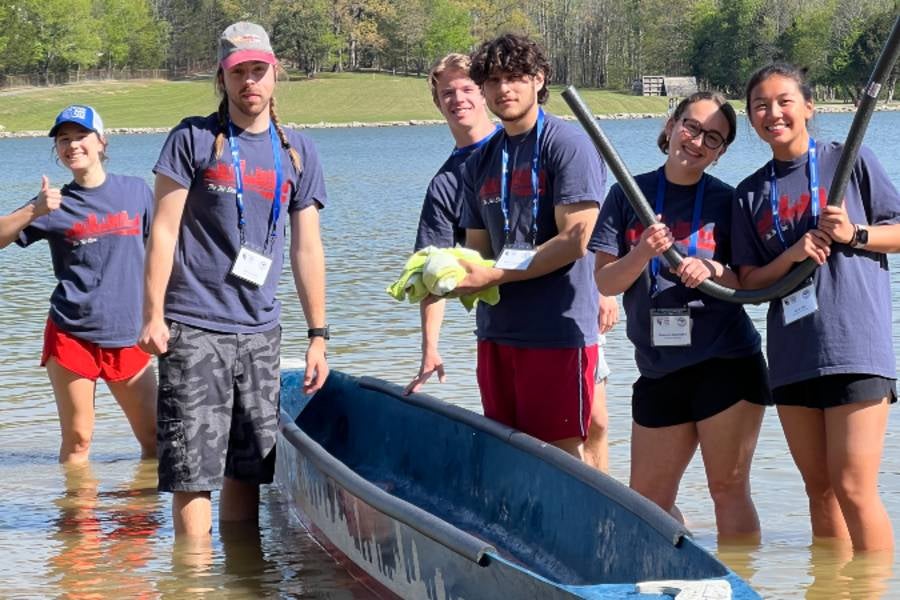 Students with the concrete canoe