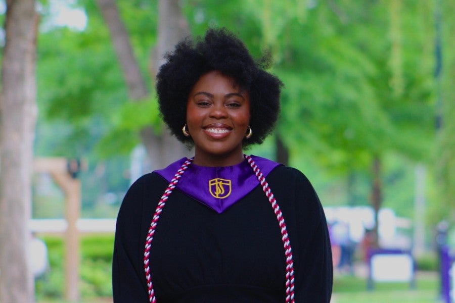 Sharon Ajiboye in graduation robes