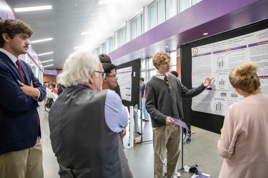 Braxton Ivie presents his research for Josh Owens at the 2026 Student Scholars Symposium