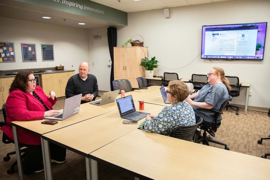 Four faculty meet to discuss best practices for AI use in education