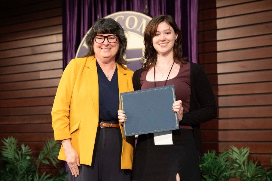 Diane Brown awarded a certificate by Lipscomb's provost