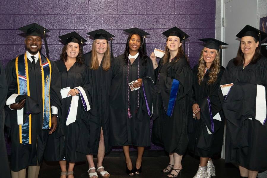 Graduate students in the tunnel before commencement. 