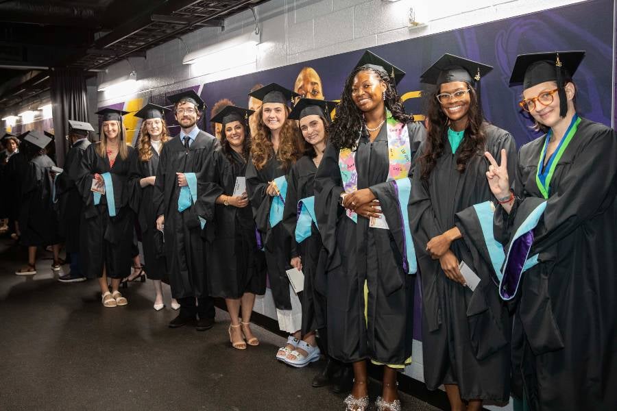 Graduate students in the tunnel before commencement. 