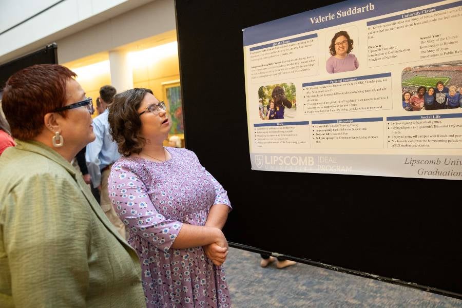 Valery presenting her poster. 