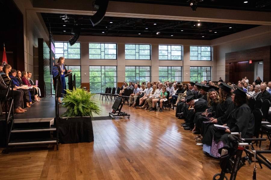 President McQueen addresses the IDEAL graduates