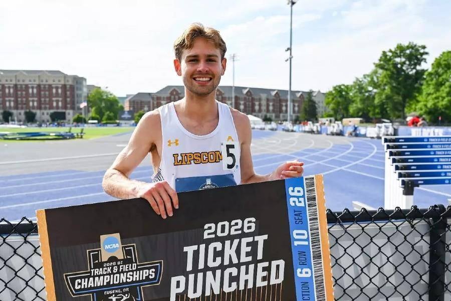 Max Hooper qualified for the NCAA Track & Field Championships and he is holding a sign saying ticket punched. 