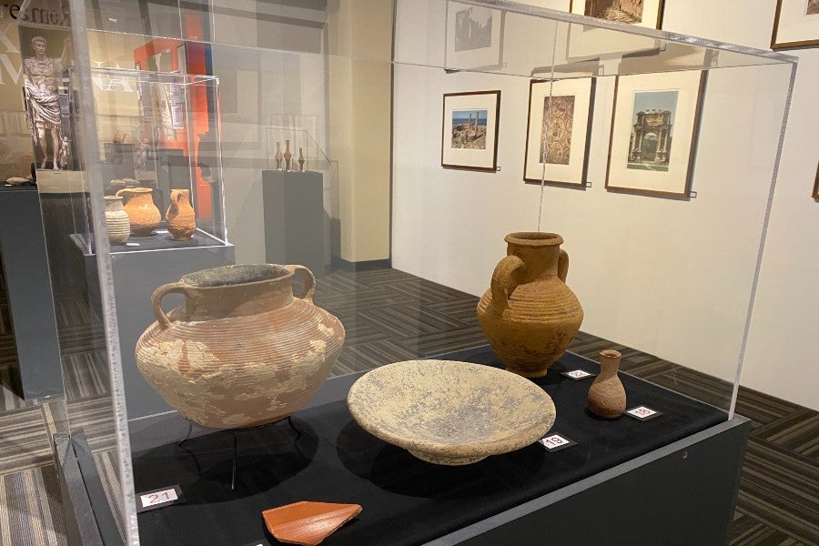 material artifacts and photos in the museum exhibit