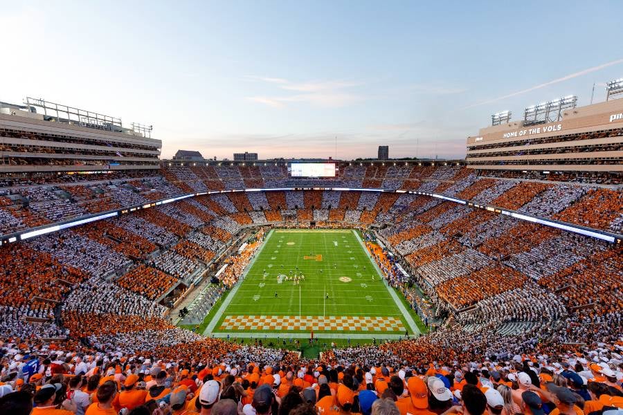Aerial view of Neyland Stadium packed with UT football fans in orange and white clothes