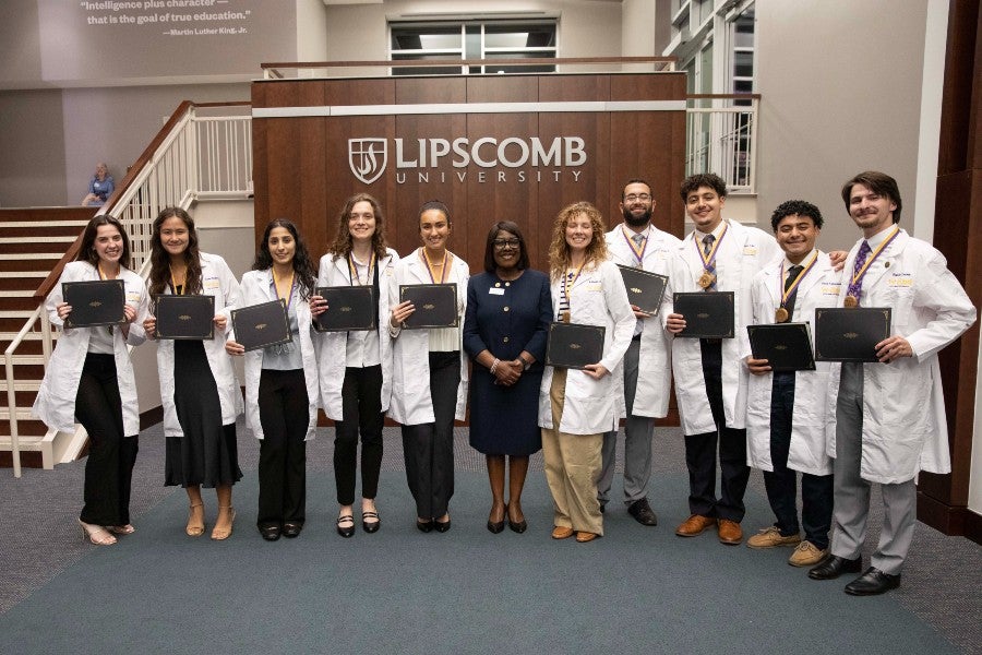 the Ward Summer Fellows posing with the coordinator of the Ward Society