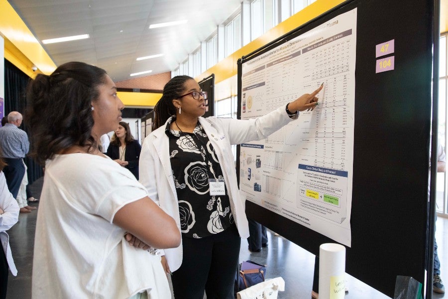 Pharmacy student Leslie Williams presents her research at the Student Scholars Synposium