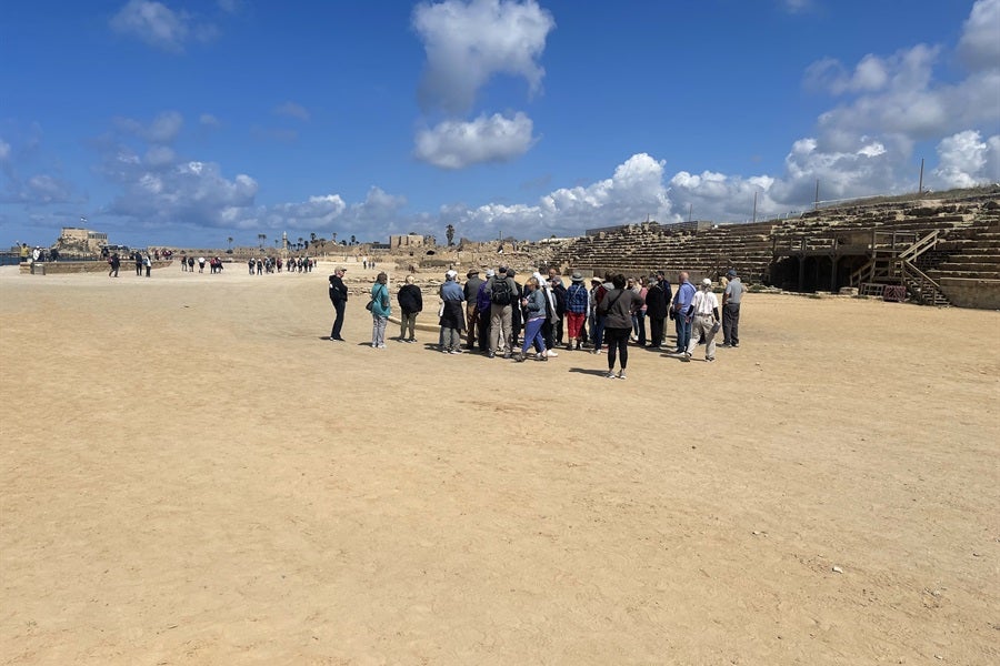 alumni and friends on a guided tour of Israel in the desert