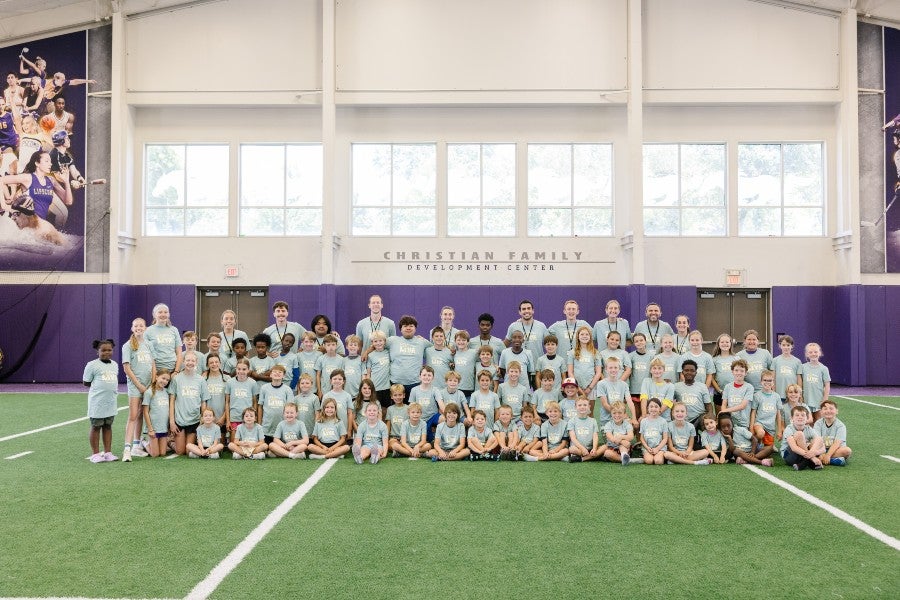a group photo of students and coaches at the 2026 All-Sports Camp in Lipscomb's McCaddams Athletic Center