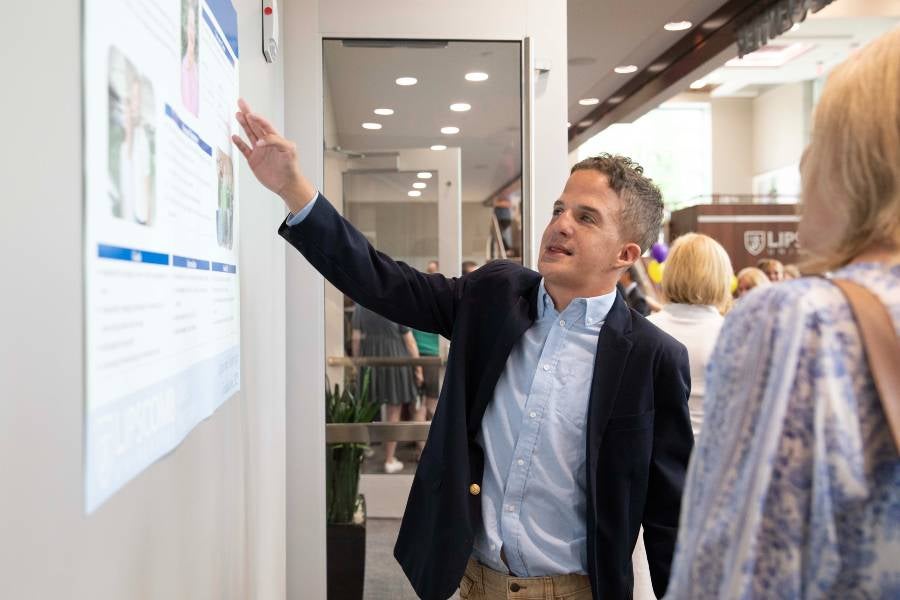 Carter Cottrell showing his work at the IDEAL poster presentation in spring 2025. 
