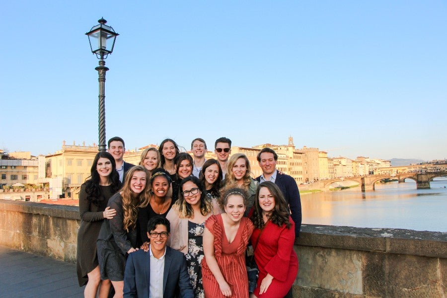 group of students posing on a bridge in Florence, Italy
