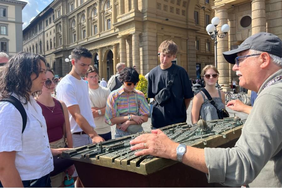 students getting an orientation lecture on the famous sites of Florence