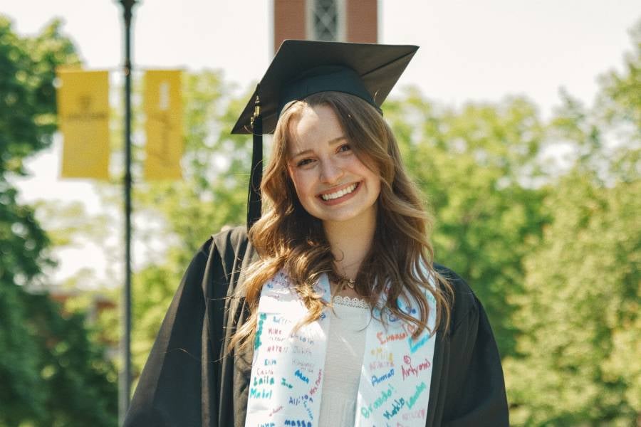 Allison Meadows in graduation gown
