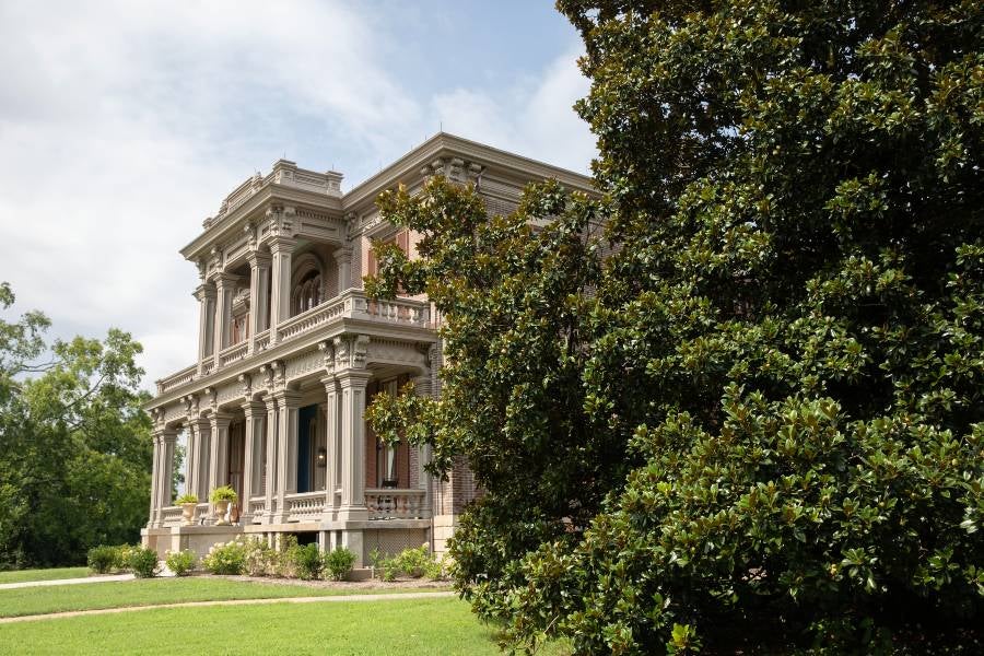 Two Rivers Mansion from the side with greenery