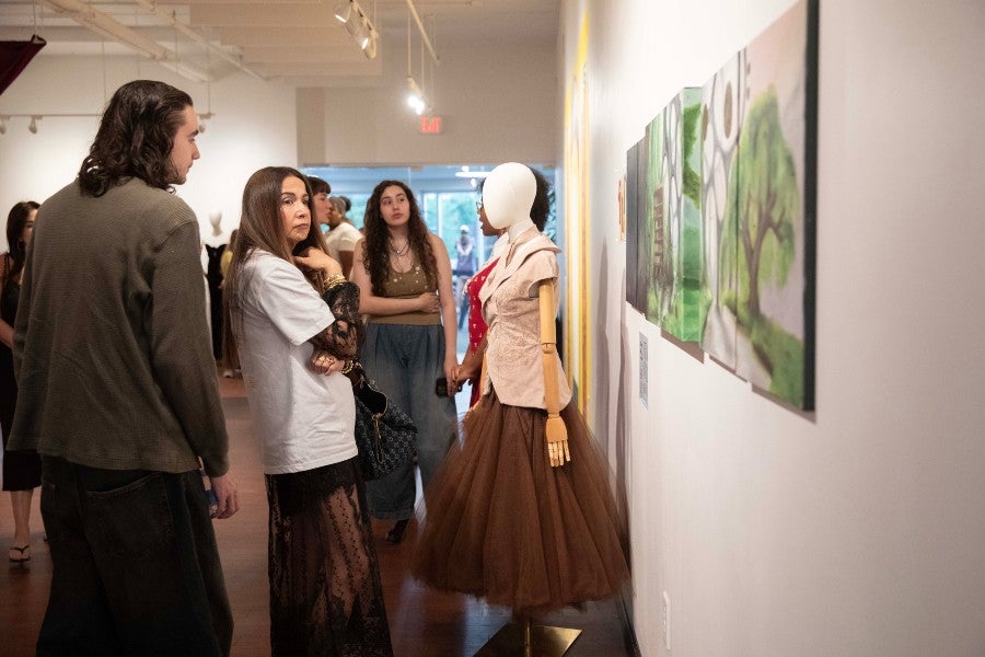 Amaris McFarlan's design with a suede jacket and tulle skirt at the October exhibit.