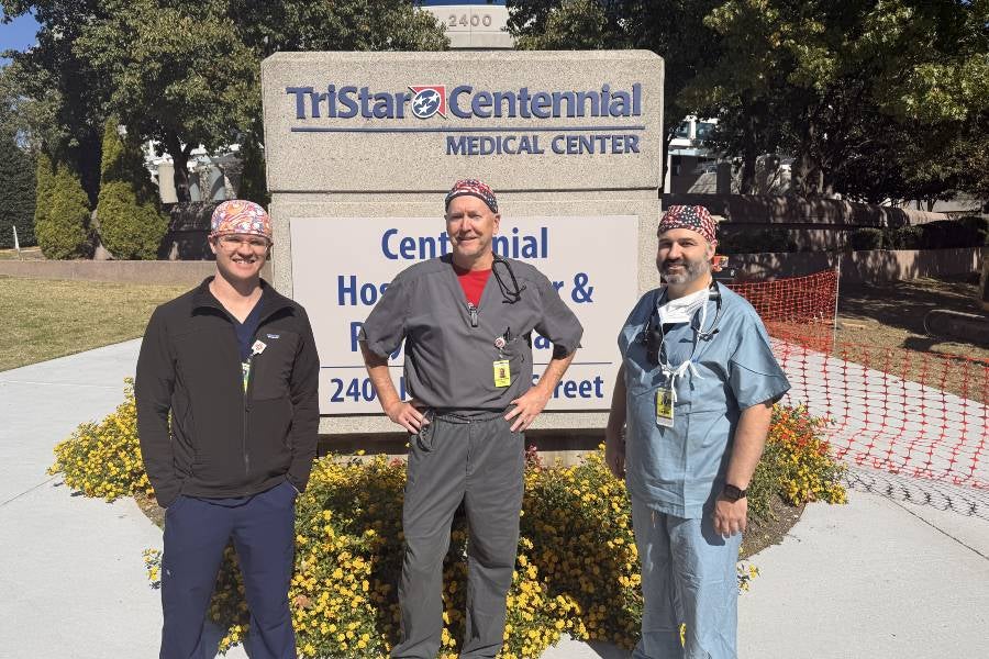 From left to right, Joseph Parrish, Jeff Bennie and Todd Christian standing in front of HCA Centennial Medical Center where they were the first CAAs to manage cases in Tennessee. 