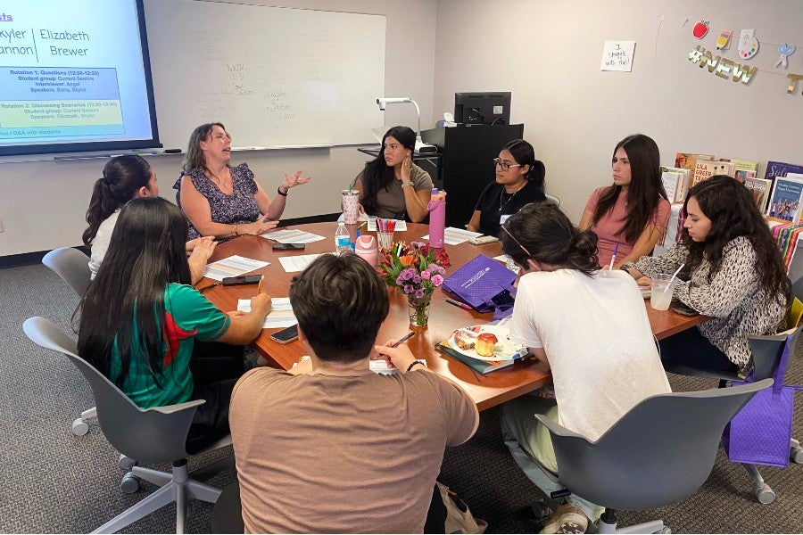teacher participants meeting at the summer training