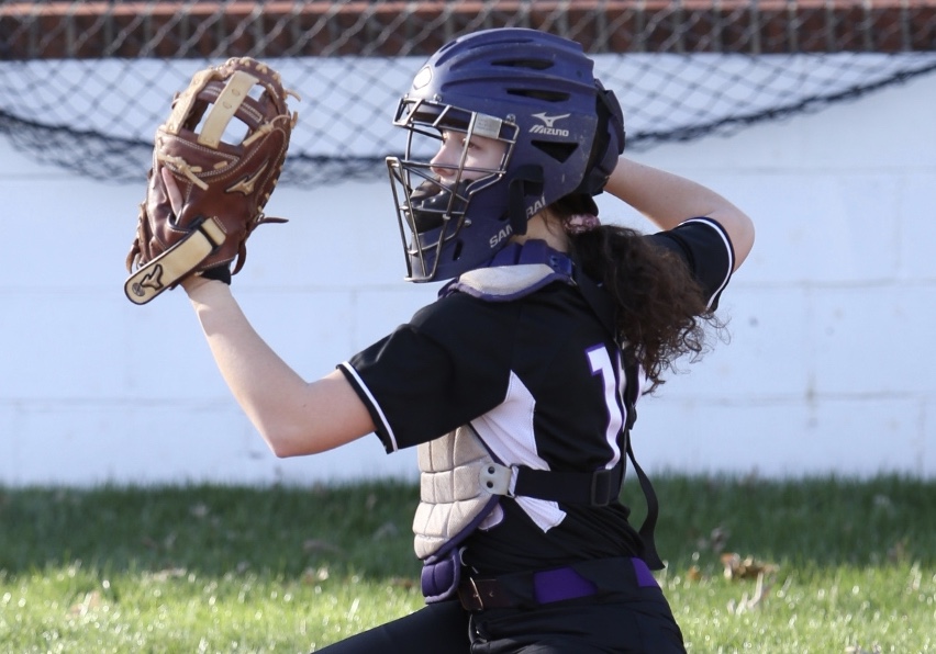 Softball Pitcher Throwing Ball