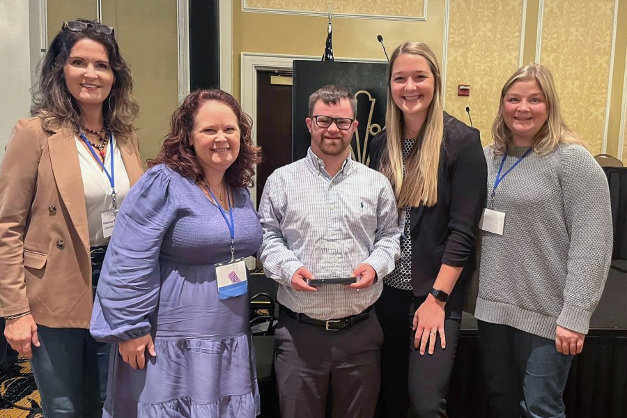 Jason Rogers at his awards ceremony with friends form the Lipscomb IDEAL program