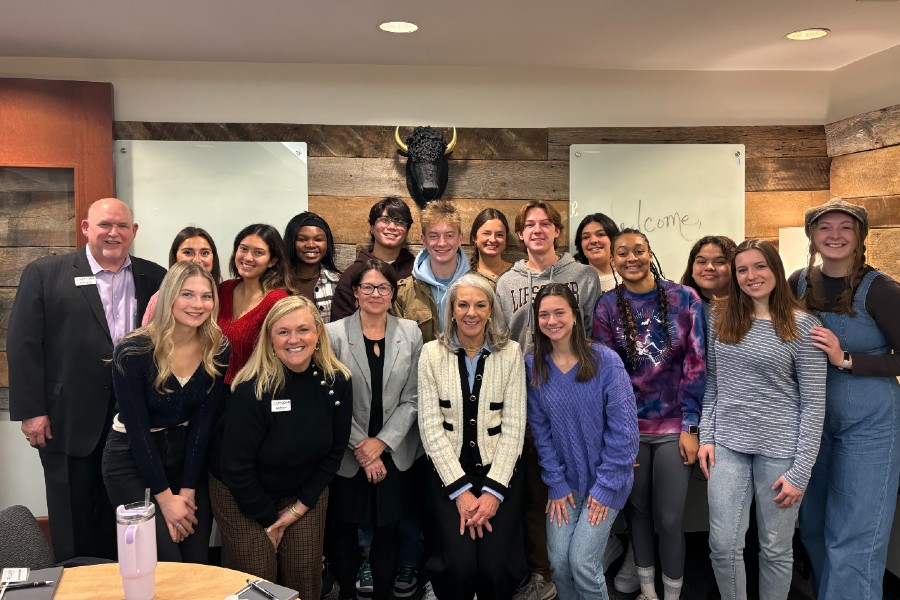 The inaugural Purposeful Business Fellows cohort with a guest speaker.