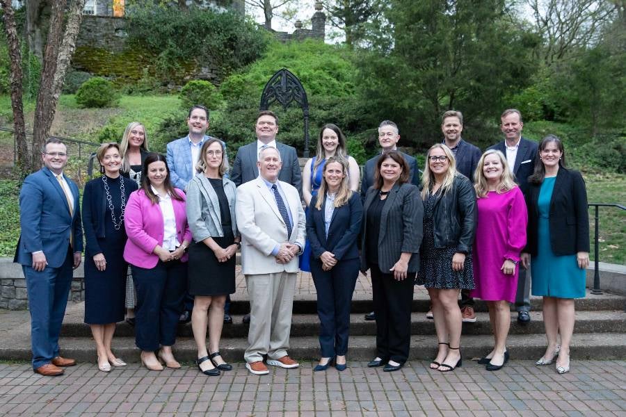 Group of CEO Connect graduates standing outside at Cheekwood in 2024. 