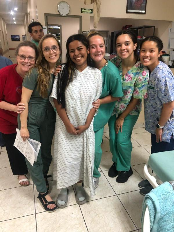 Lipscomb nursing students pose with a happy Guatemalan patient