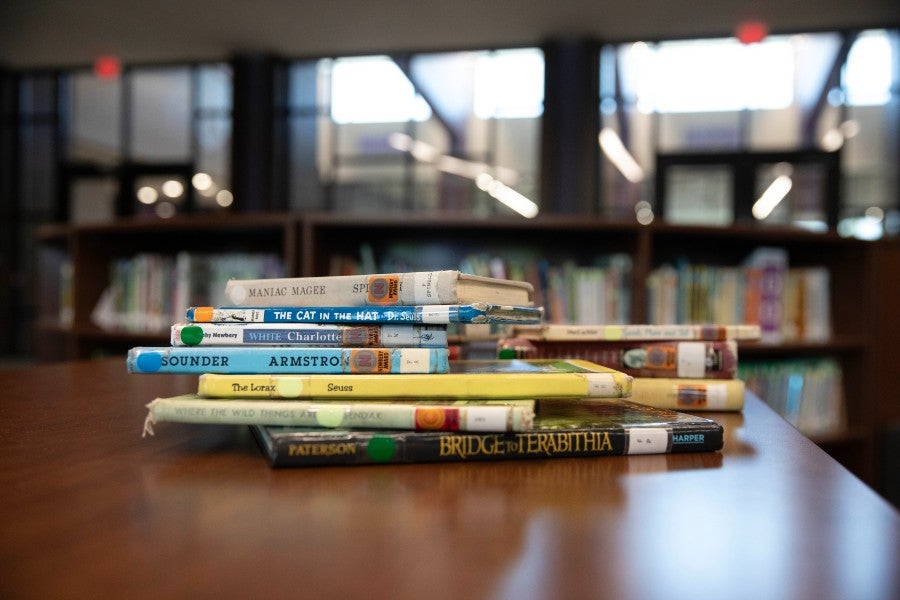Stack of children's books in a library