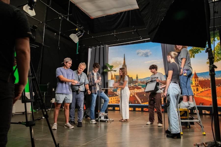 Students using the new virtual production volume stage.