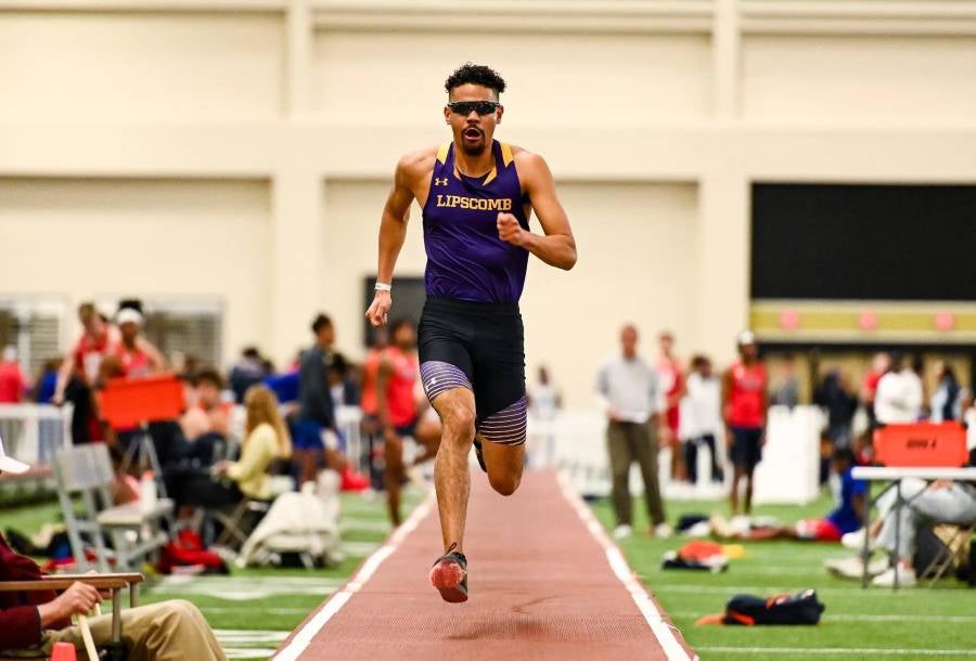 Martin running for the long jump in competition. 