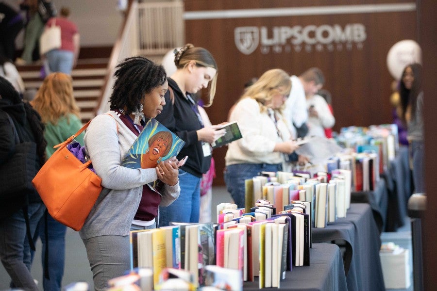Participants at the book table at 2025's Global Voices Conference
