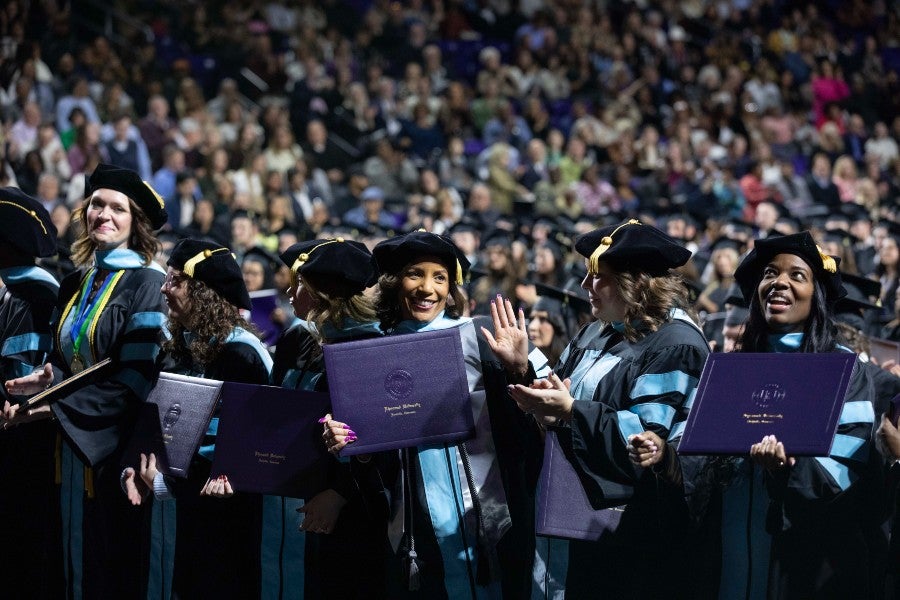  Students celebrating during commencement