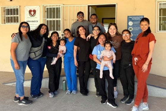 Team posing with Baja Physicians 
