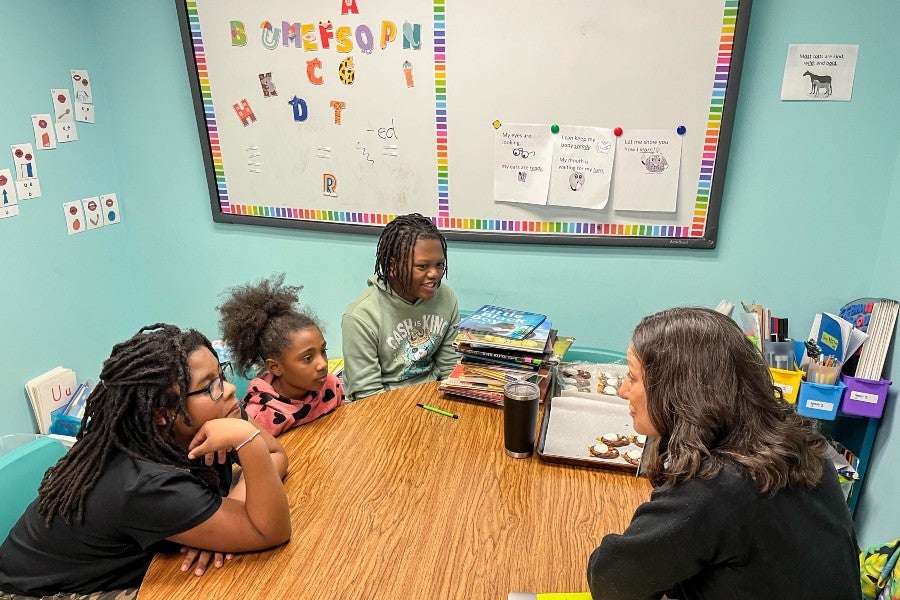 Students in group session at the Preston Taylor Ministries after-school program