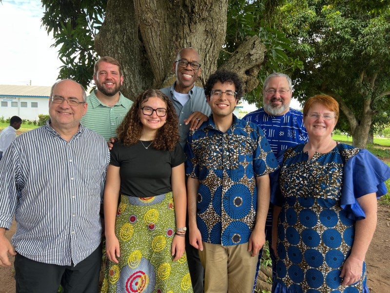 Team standing together in Ghana