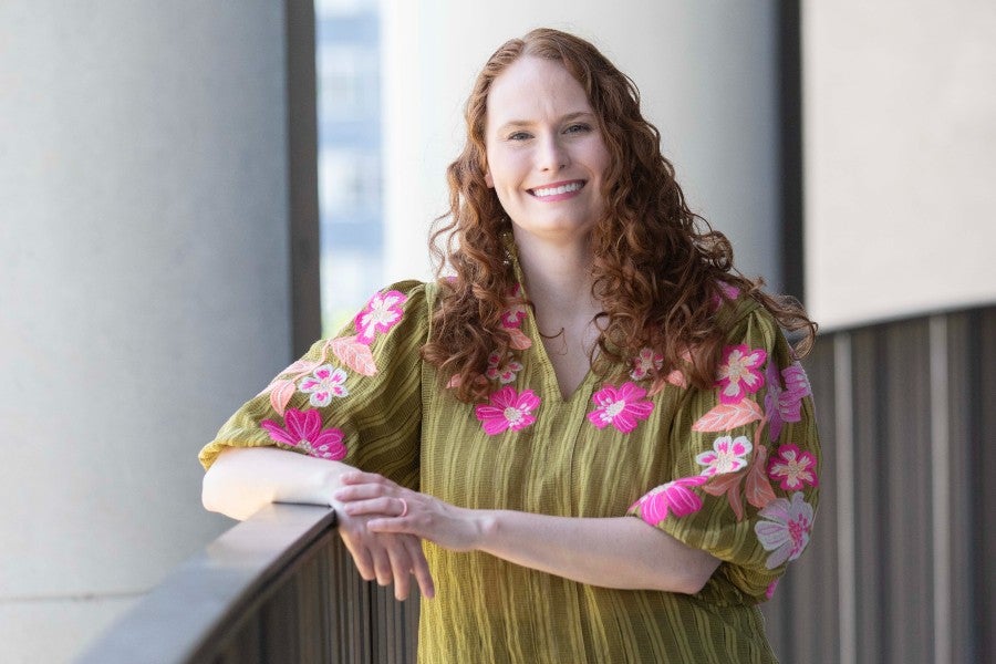 portrait of Kate Gunn at the state museum building