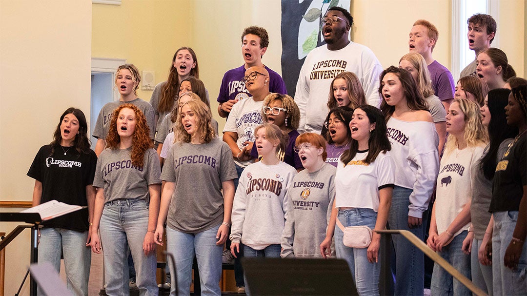 Choral students singing