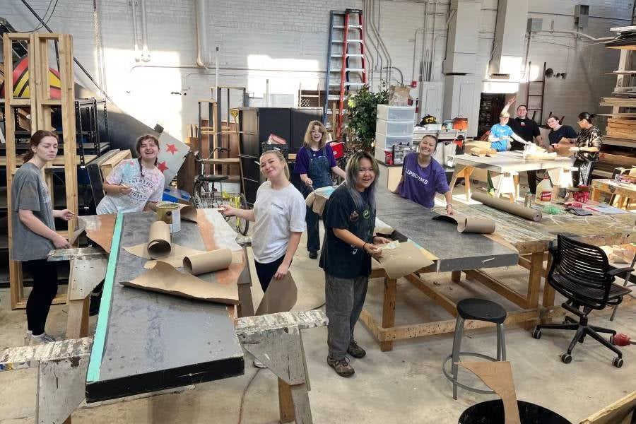 Students in Lipscomb's scene shop prepare for a production. 