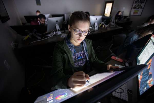 student working on computer