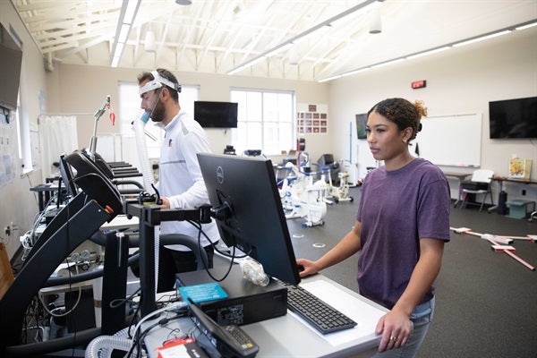 kinesiology student monitoring oxygen levels