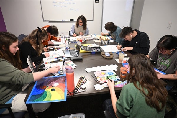 students getting hands on experience with art therapy