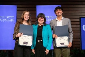 Ellie Griner and Kai Lam with the Provost at the Student Scholars Symposium