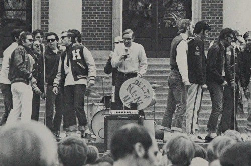 The first Delta Na Na Na performers on the stairs of Alumni Auditorium