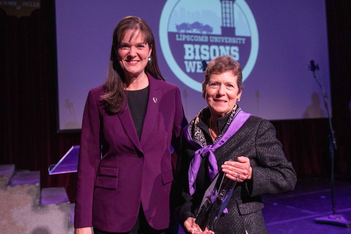 Robbie Davis with President Candice McQueen at the awards presentation